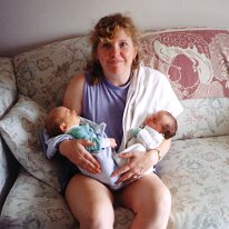 Becky holding twins scan