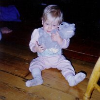 Baby Caitlin hugs ratty