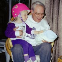 Dad Caitlin helmet baby Meaghan