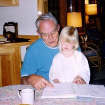 Dad and Caitlin reading