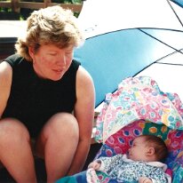 Becky with baby Zoe sun umbrella